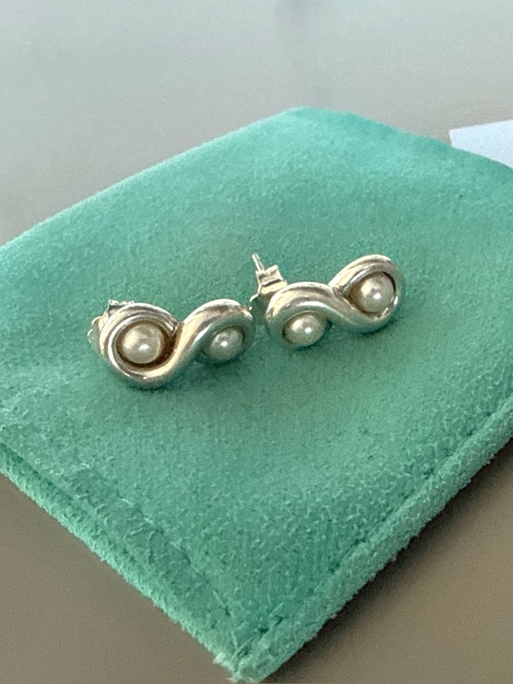 Tiffany & Co. silver infinity symbol w/freshwater cultured pearls earrings
